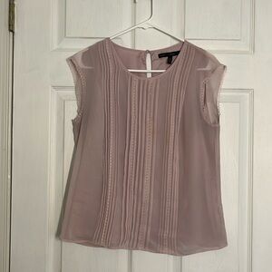 Sleeveless pale, pink lace front blouse